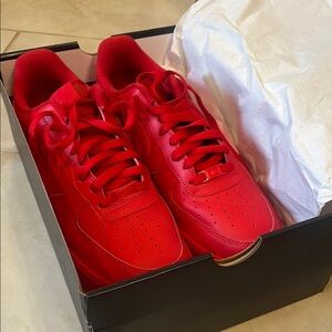 Nike Air Force 1 Red Low-Top Sneakers with Monochromatic Design